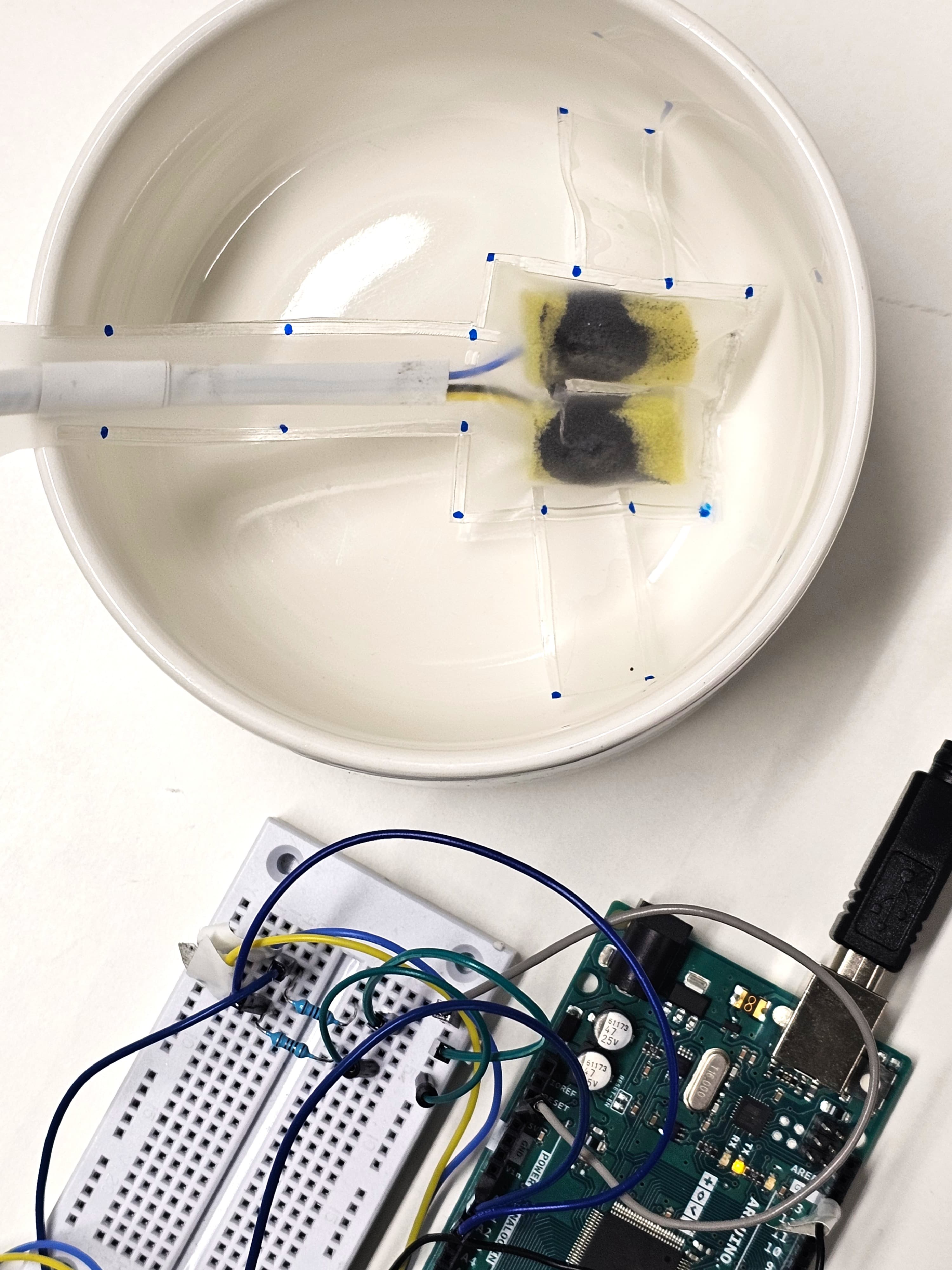 Soft intra oral interface with two buttons - pressing affordance - compression